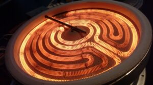 Closeup of a hot electric kitchen induction burner