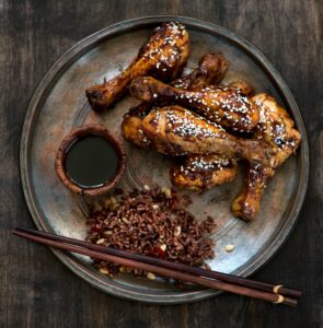 Grilled chicken drumstick with sesame, brown rice and soy sauce