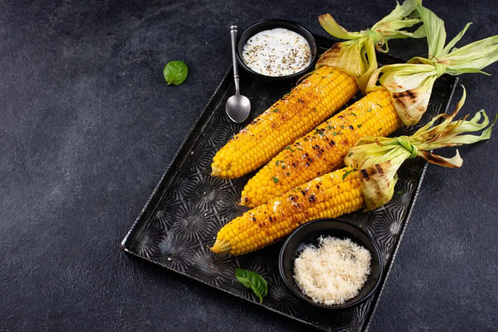 Grilled corn cobs with parmesan cheese